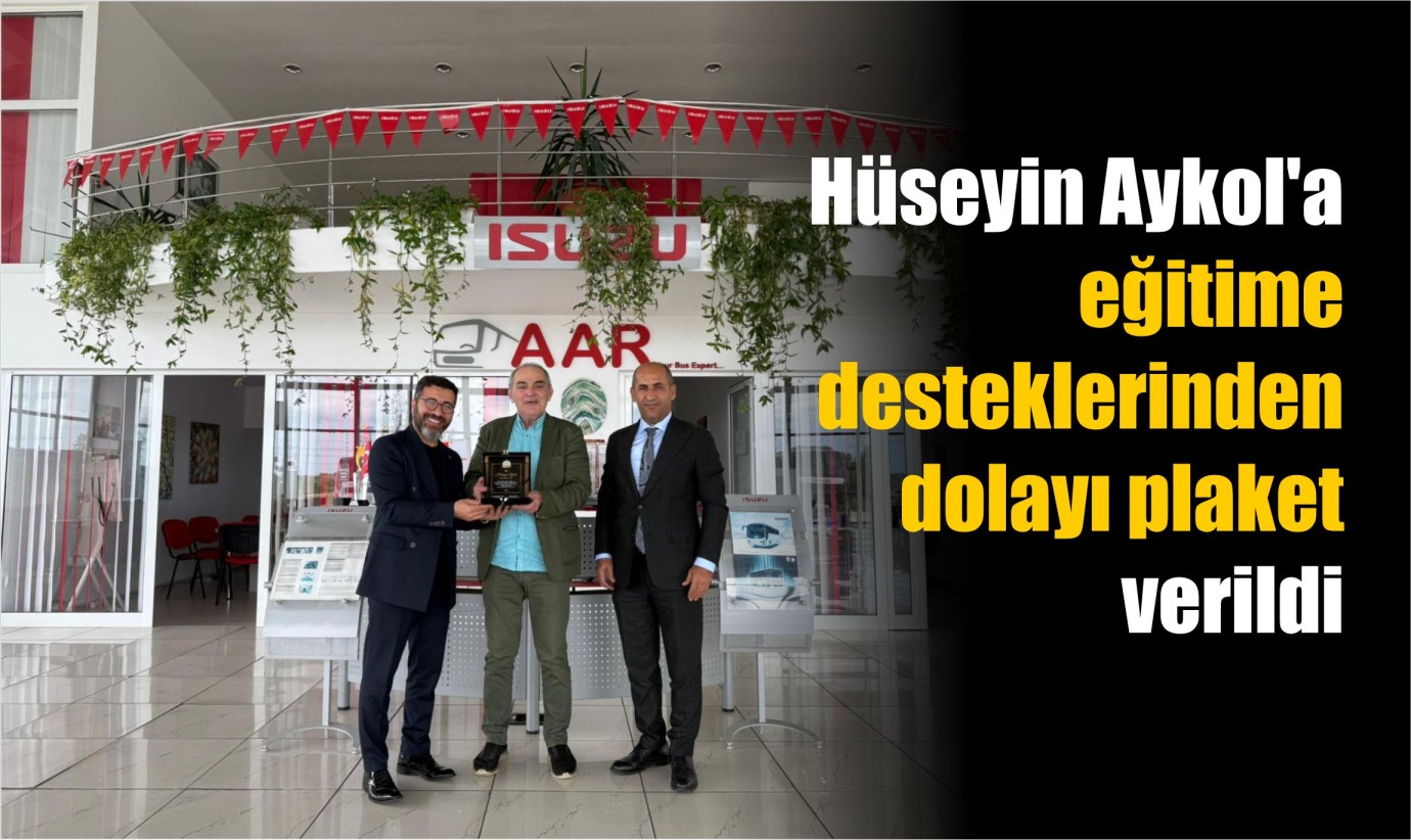 Hüseyin Aykol'a eğitime katkılarından dolayı plaket verildi